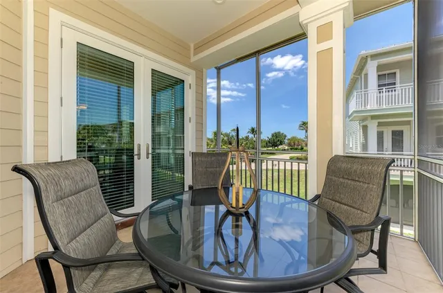 a bathroom with a granite countertop sink vanity mirror shower and a mirror