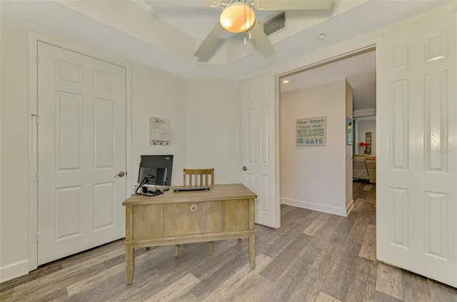 a bathroom with a granite countertop sink a shower and a mirror