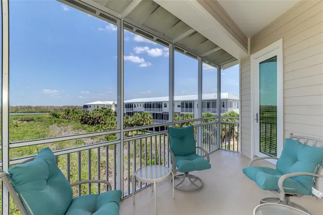 a view of a swimming pool with a yard