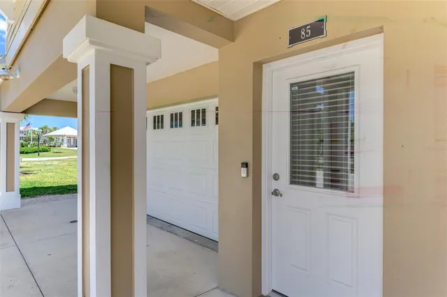 a view of entryway with wooden floor and stairs