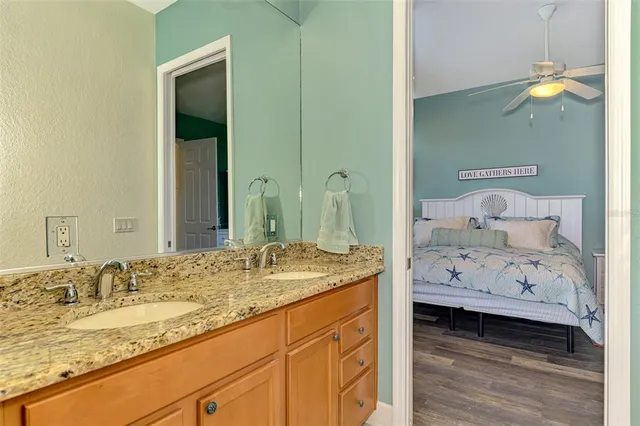 a view of a swimming pool with a garden and plants