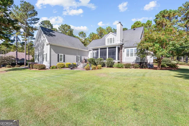 a front view of building with yard