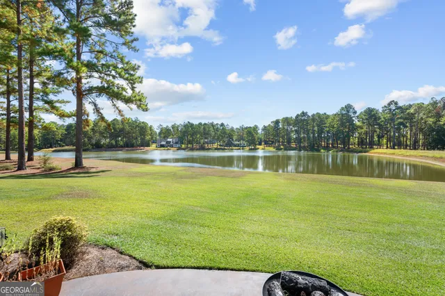 a view of a lake with a big yard