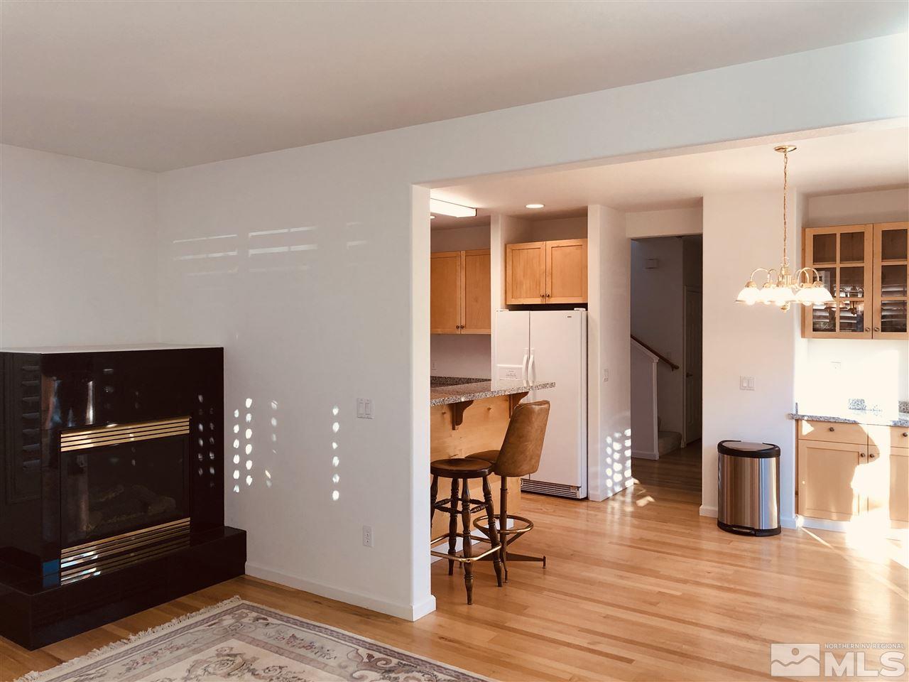 540 Warren Court Reno, NV 89509 - Photo 5 of 17 a living room with furniture and a fireplace