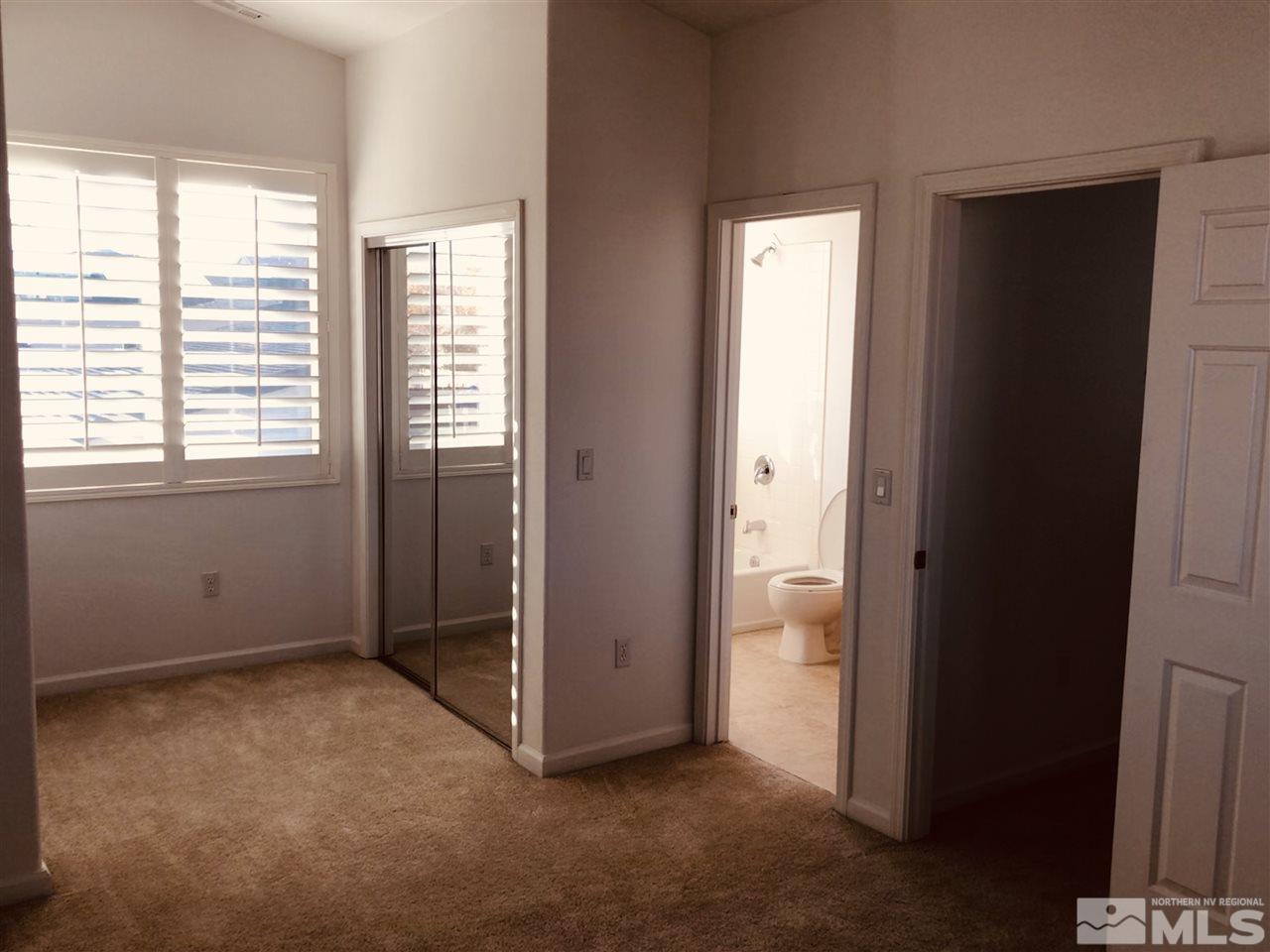 540 Warren Court Reno, NV 89509 - Photo 8 of 17 an empty room with windows and a bathroom