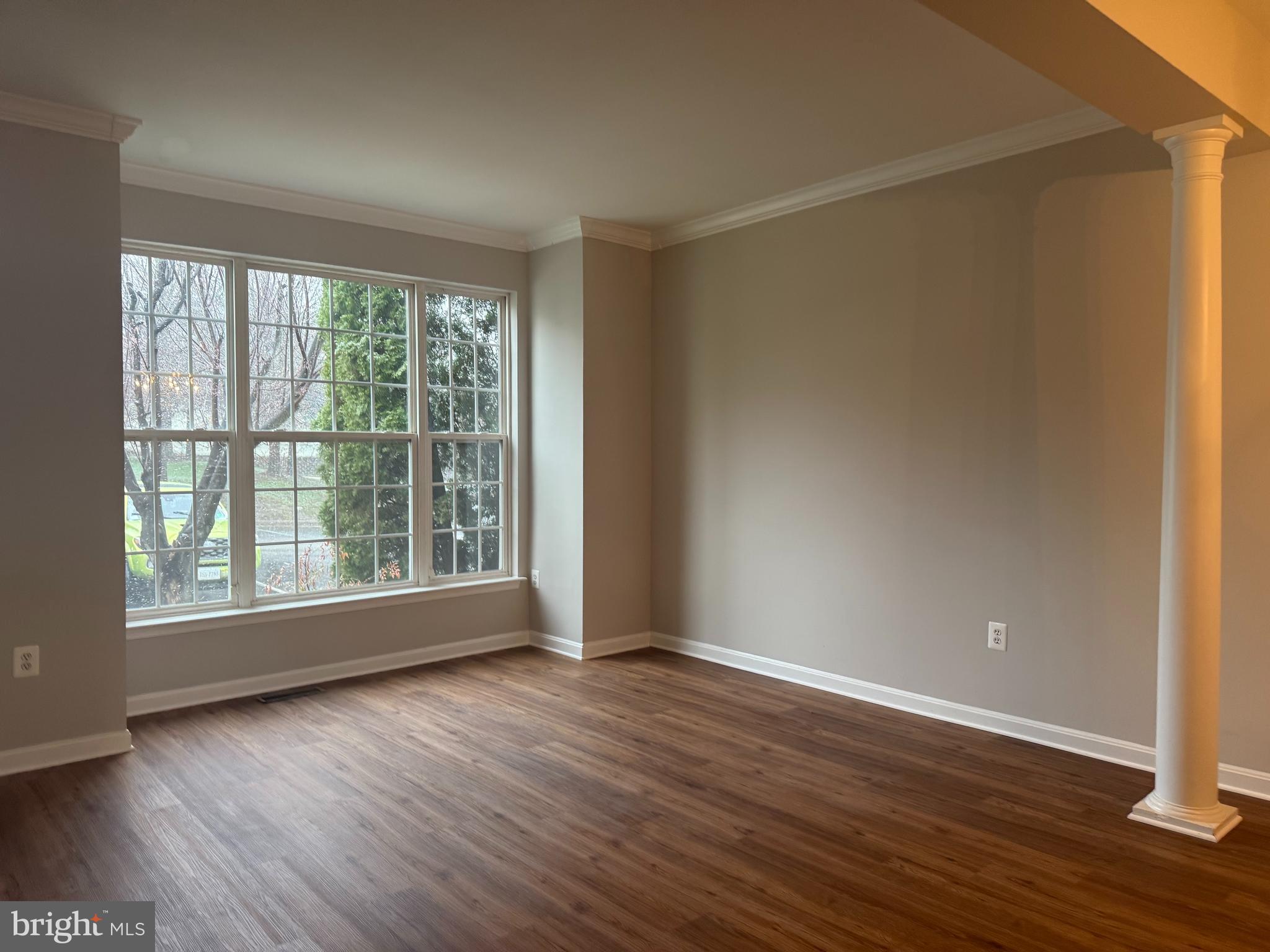 2925 Rotterdam Loop Woodbridge, VA 22191 - Photo 16 of 55 a view of room with window and wooden floor