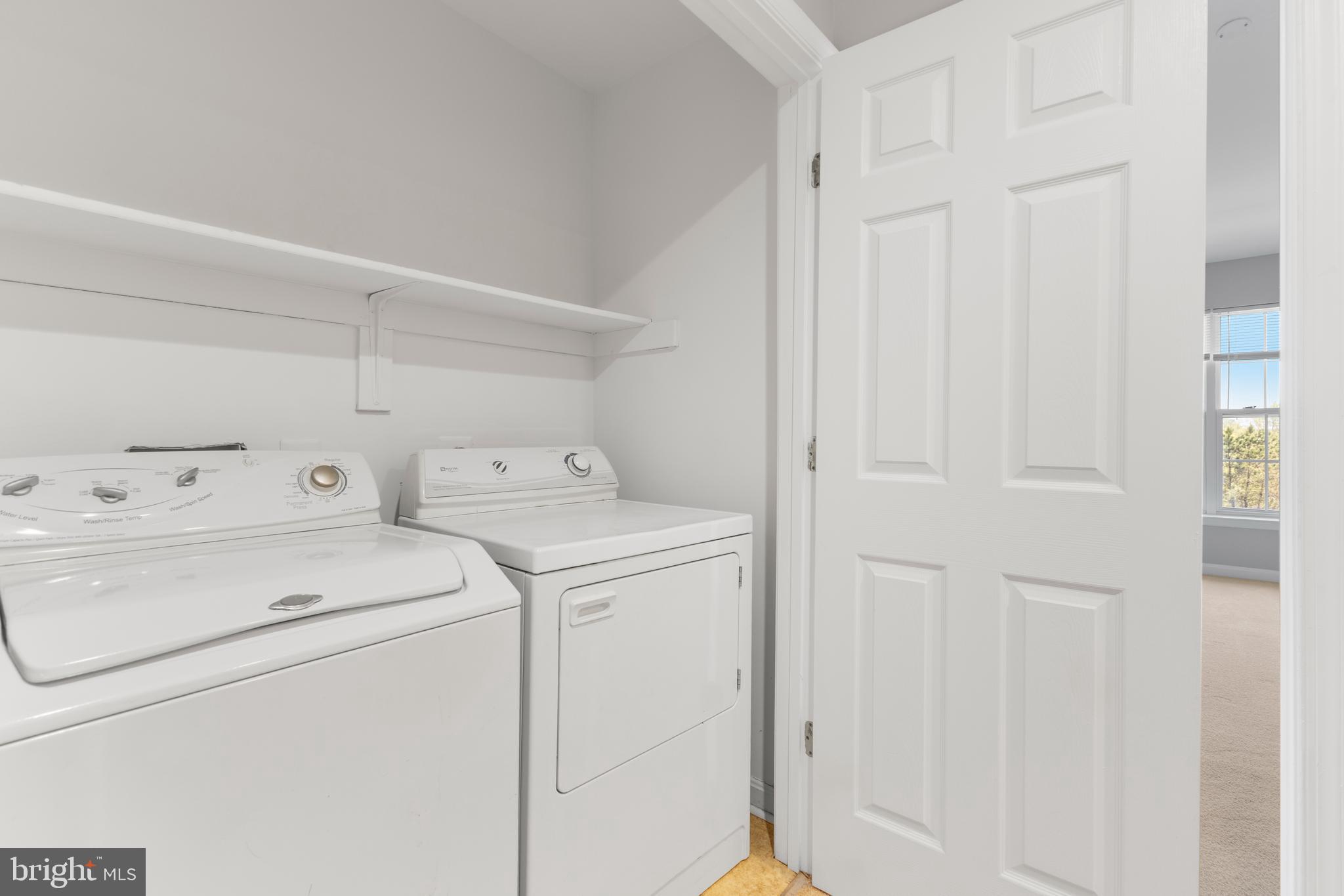 2925 Rotterdam Loop Woodbridge, VA 22191 - Photo 22 of 55 a utility room with dryer and washer