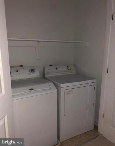 2925 Rotterdam Loop Woodbridge, VA 22191 - Photo 52 of 55 a utility room with dryer and washer