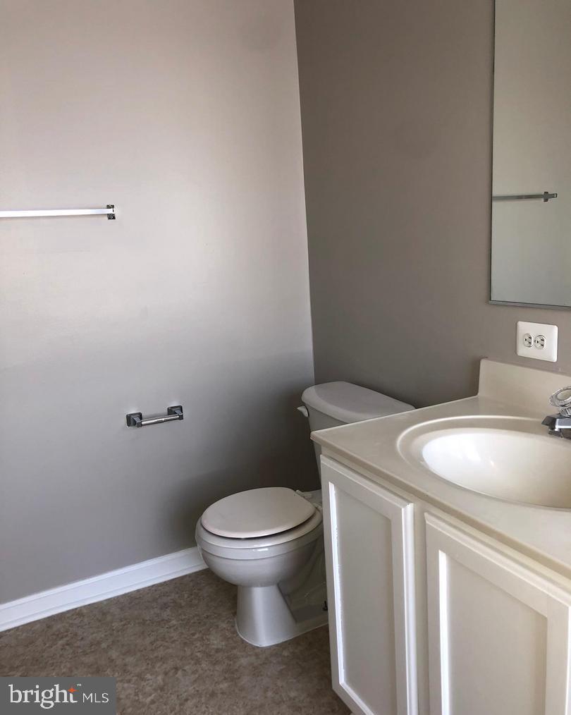 2925 Rotterdam Loop Woodbridge, VA 22191 - Photo 8 of 55 a bathroom with a toilet and a sink