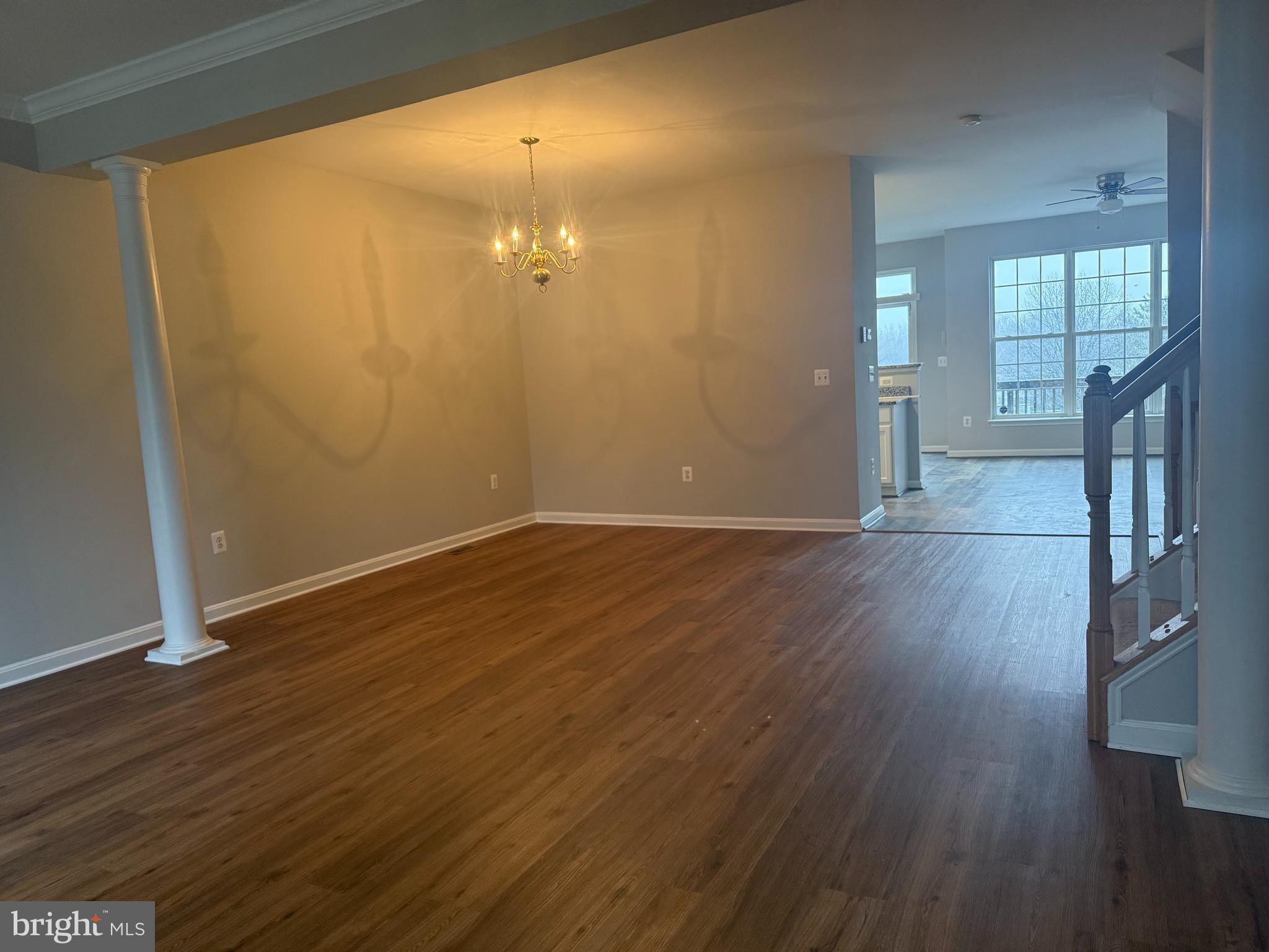 2925 Rotterdam Loop Woodbridge, VA 22191 - Photo 10 of 55 an empty room with wooden floor and windows