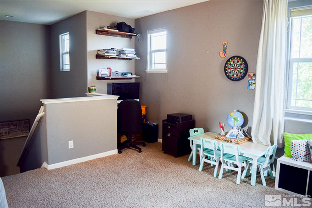 11180 Parma Way Reno, NV 89521 - Photo 14 of 37 a workspace with furniture and window