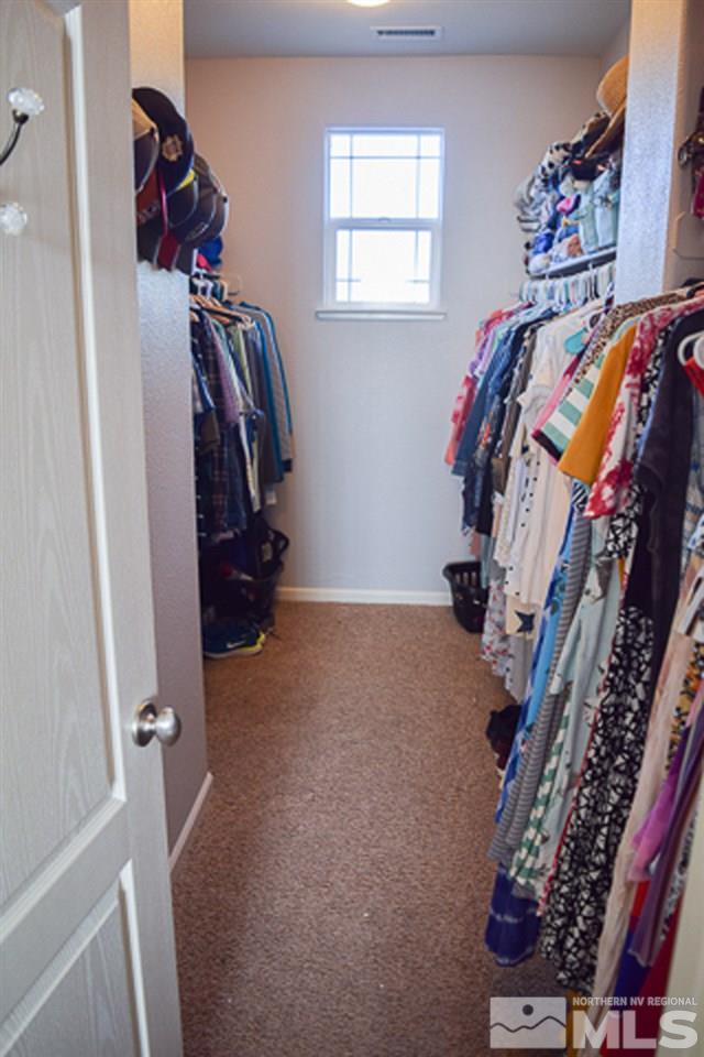 11180 Parma Way Reno, NV 89521 - Photo 20 of 37 a view of a closet with storage