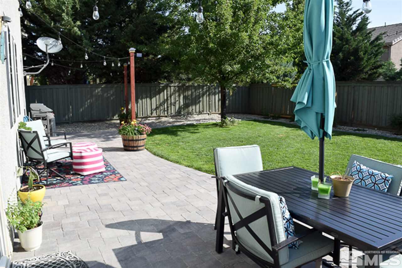 11180 Parma Way Reno, NV 89521 - Photo 34 of 37 a view of a backyard with sitting area