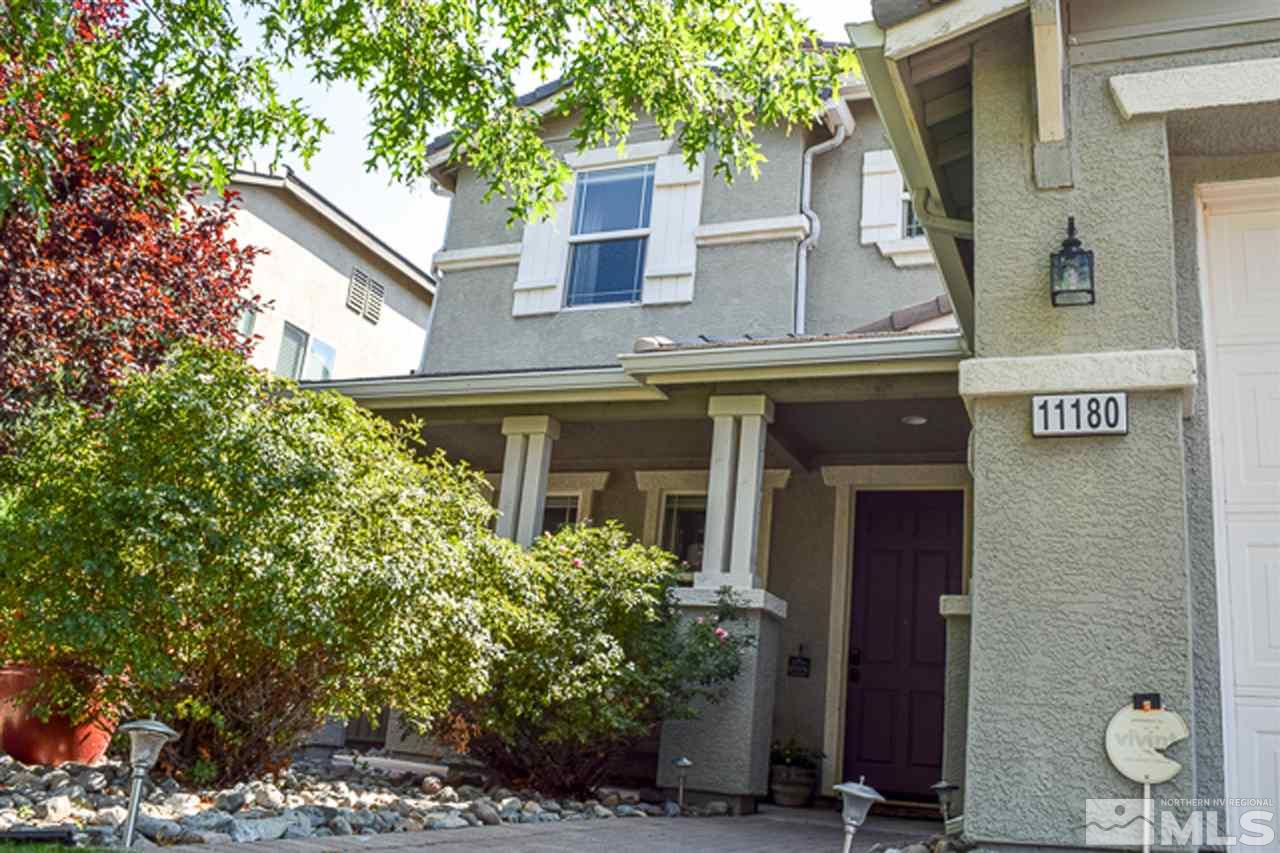 11180 Parma Way Reno, NV 89521 - Photo 4 of 37 a view of a house with potted plants