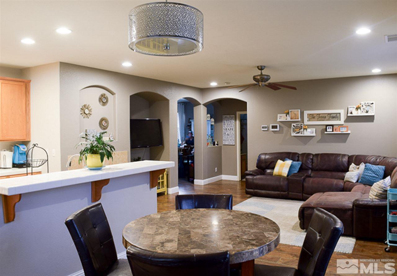 11180 Parma Way Reno, NV 89521 - Photo 9 of 37 a view of a dining room with furniture