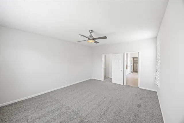 a bathroom with a shower and a tub