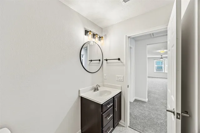 a view of a chair and table in backyard