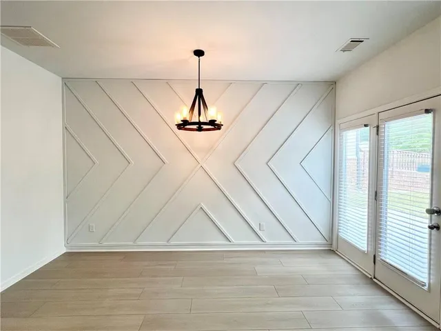 a view of empty room with windows