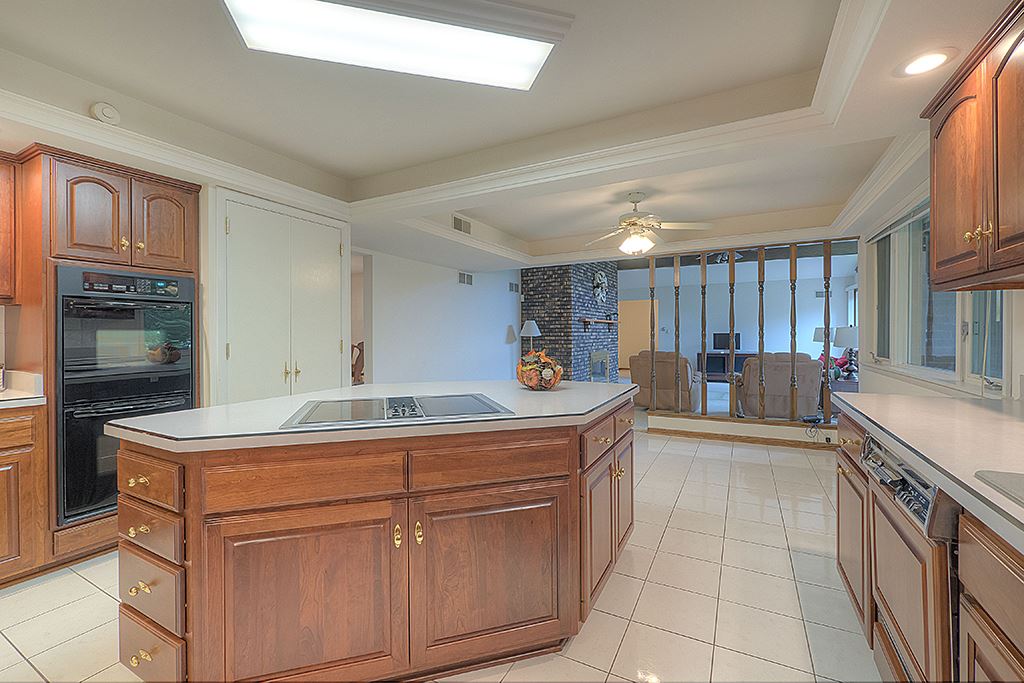 4215 Landstrom Road Rockford, IL 61114 - Photo 12 of 25 a kitchen with a sink and cabinets
