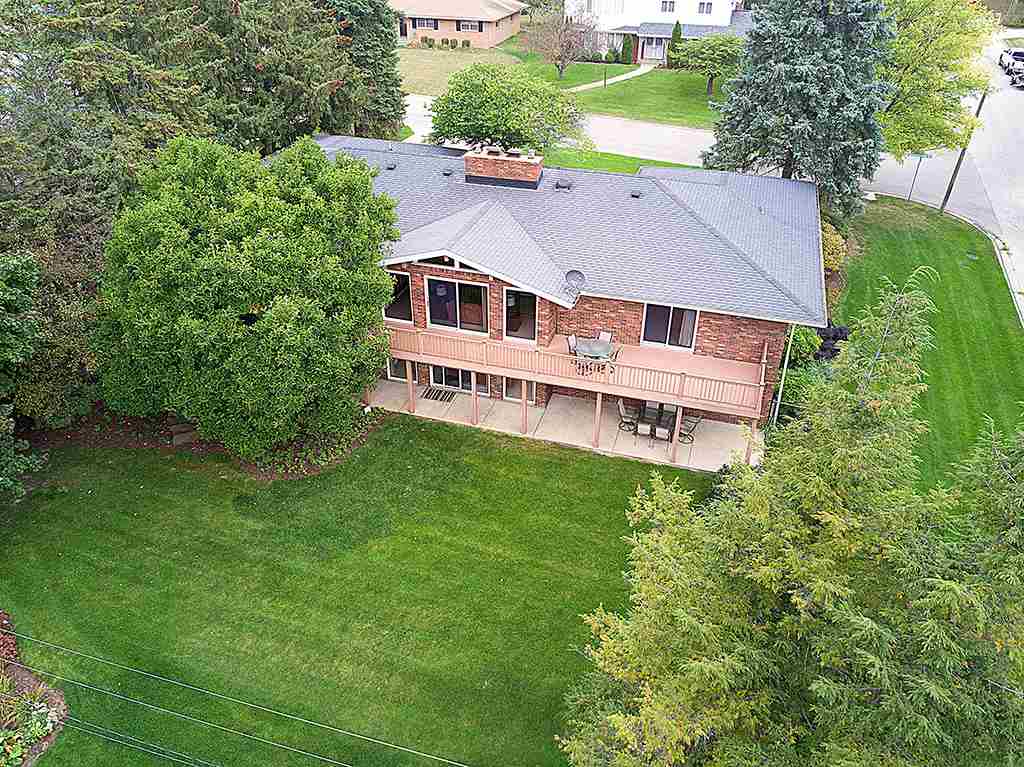 4215 Landstrom Road Rockford, IL 61114 - Photo 24 of 25 an aerial view of a house with a big yard