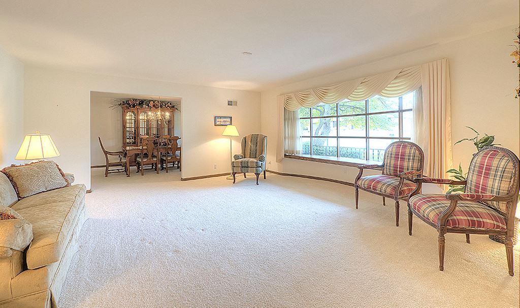 4215 Landstrom Road Rockford, IL 61114 - Photo 4 of 25 a living room with furniture and a window