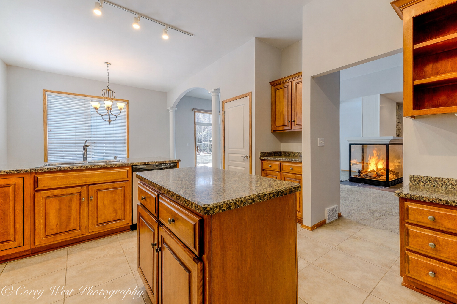 620 Ridge Drive Elburn, IL 60119 - Photo 16 of 46 a kitchen with stainless steel appliances granite countertop a sink and cabinets