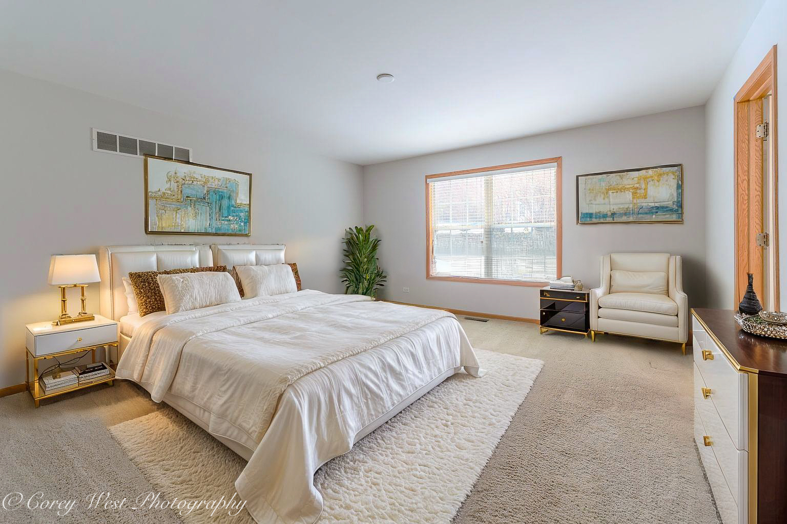 620 Ridge Drive Elburn, IL 60119 - Photo 23 of 46 a spacious bedroom with a bed and a couch