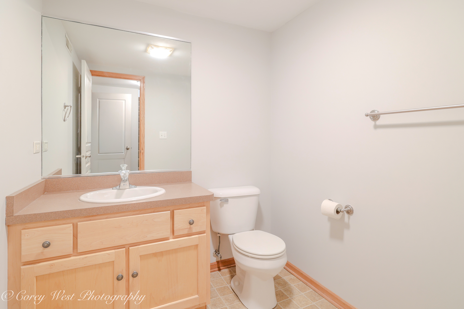 620 Ridge Drive Elburn, IL 60119 - Photo 37 of 46 a bathroom with a granite countertop sink a toilet and mirror