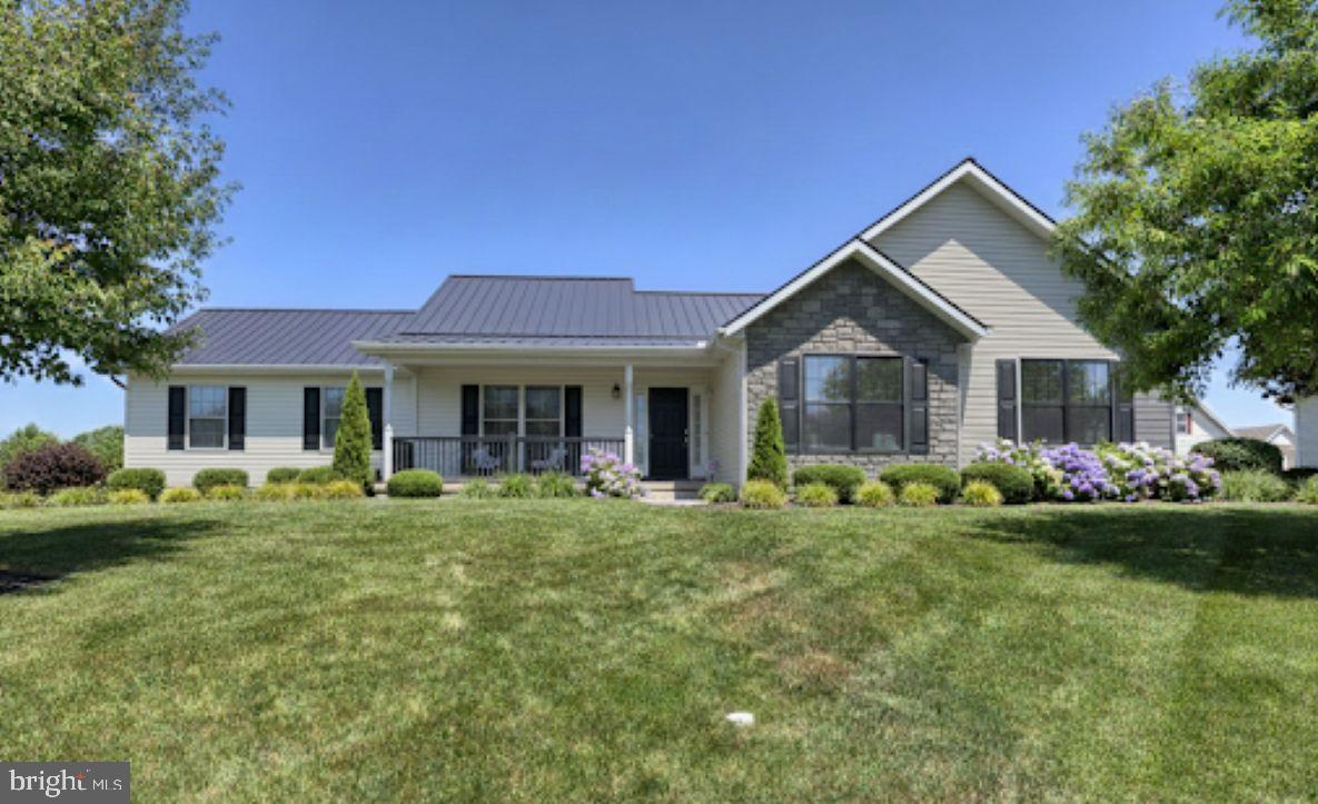 2 Rolling Meadow Road Lebanon, PA 17046 - Photo 1 of 1 a front view of a house with a garden and porch