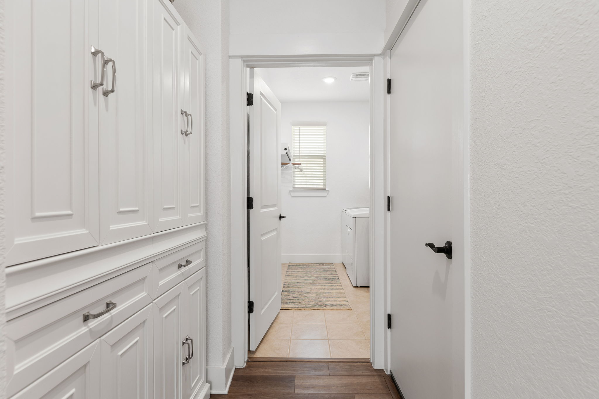 640 Martingale Street Georgetown, TX 78633 - Photo 13 of 39 Hallway leading to laundry room