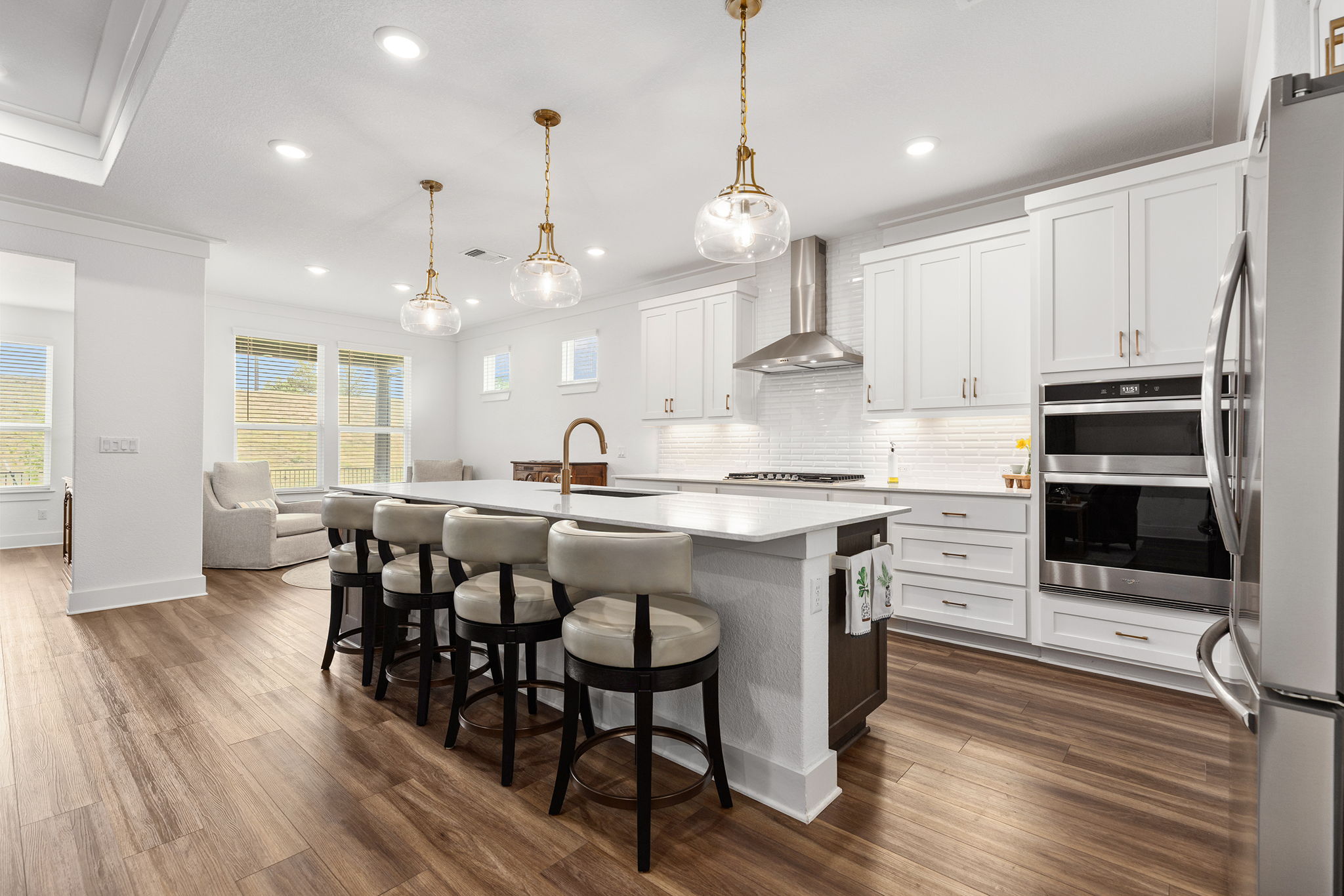 640 Martingale Street Georgetown, TX 78633 - Photo 16 of 39 This delightful kitchen offers oodles of counter top space, upgraded lighting over the island, and under cabinet lighting.