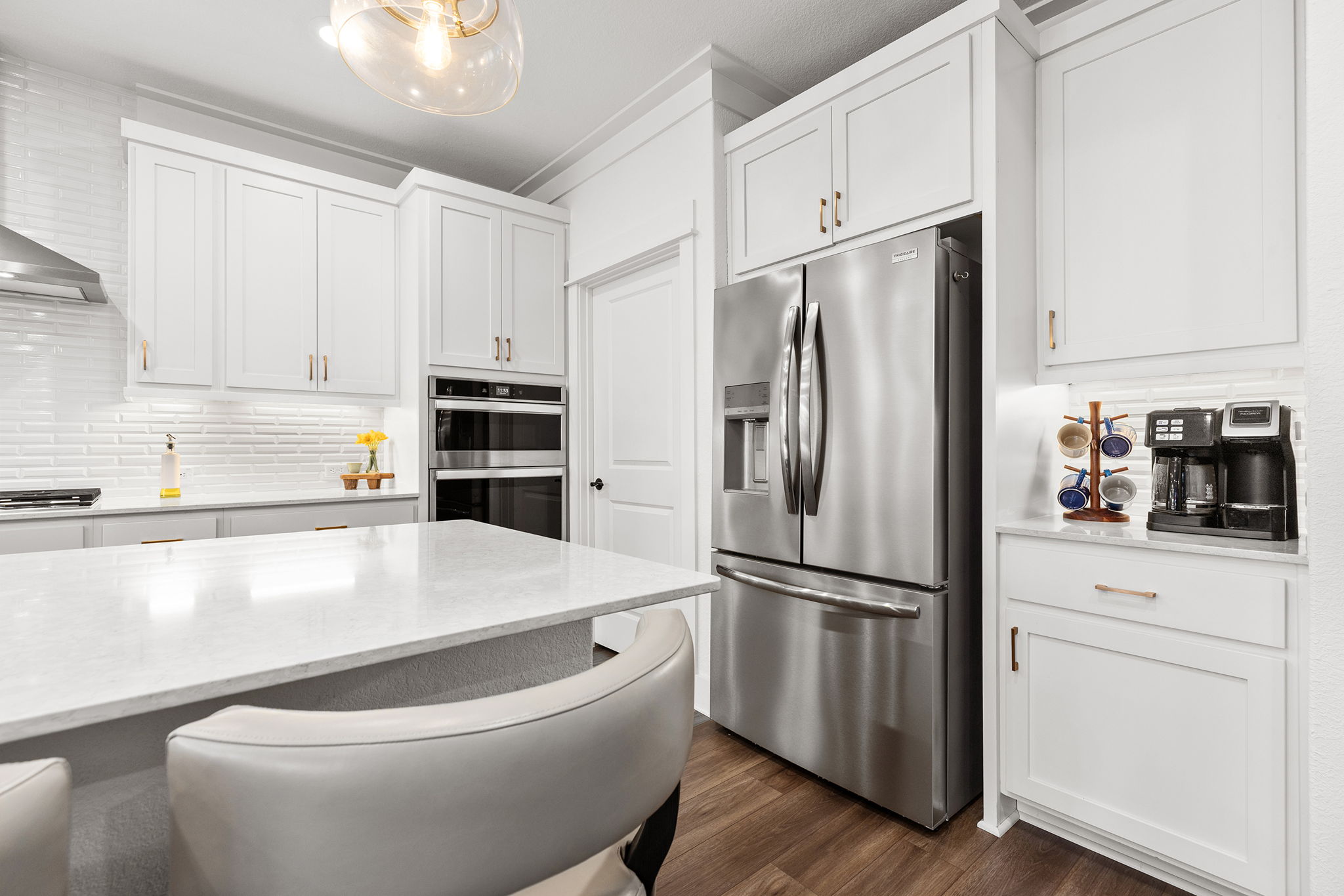 640 Martingale Street Georgetown, TX 78633 - Photo 19 of 39 Loads of cabinet space with pull outs inside offer plenty of storage options.