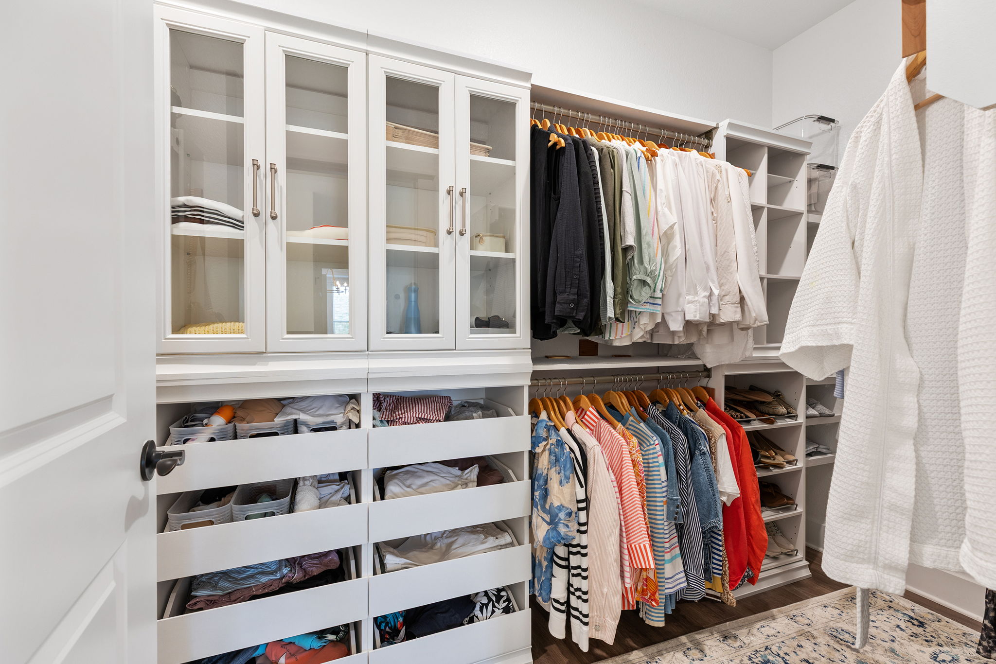 640 Martingale Street Georgetown, TX 78633 - Photo 34 of 39 Walk in closet offers built in wall system, and light wood finished floors