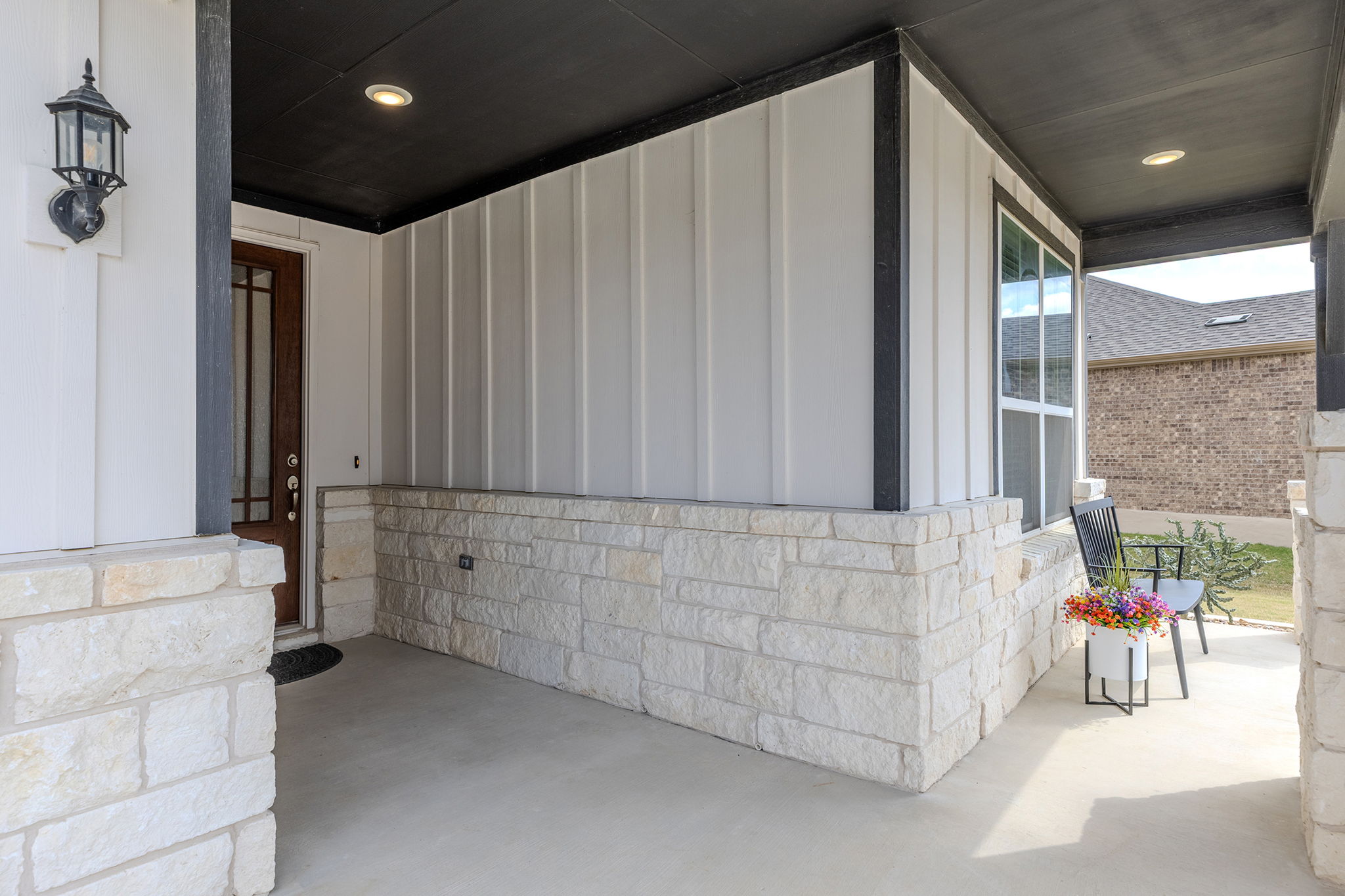 640 Martingale Street Georgetown, TX 78633 - Photo 4 of 39 View of exterior entry featuring board and batten siding and covered porch