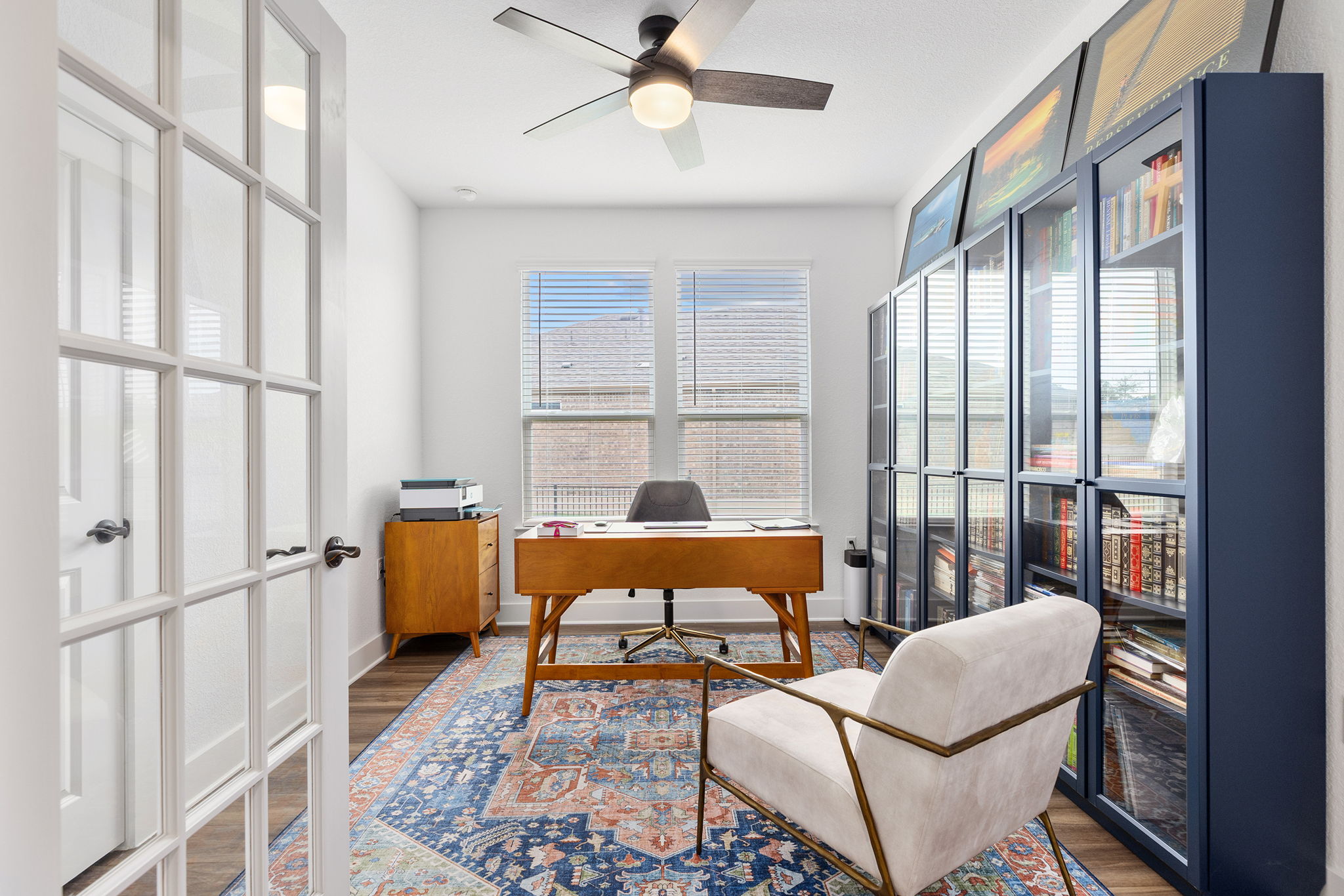 640 Martingale Street Georgetown, TX 78633 - Photo 7 of 39 Office space featuring wood finished floors, a ceiling fan, and french doors