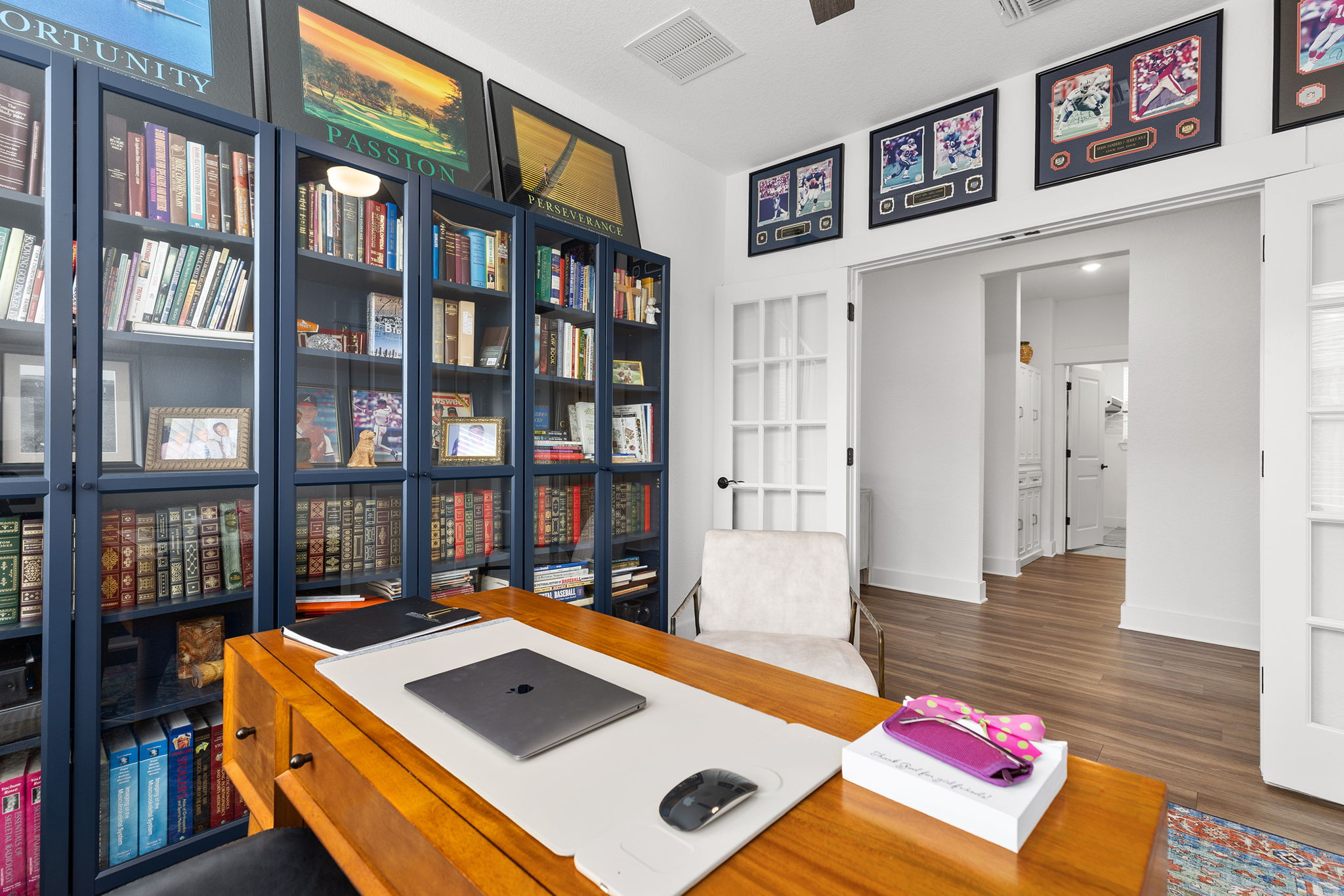 640 Martingale Street Georgetown, TX 78633 - Photo 8 of 39 Home office featuring dark wood-style floors and baseboards