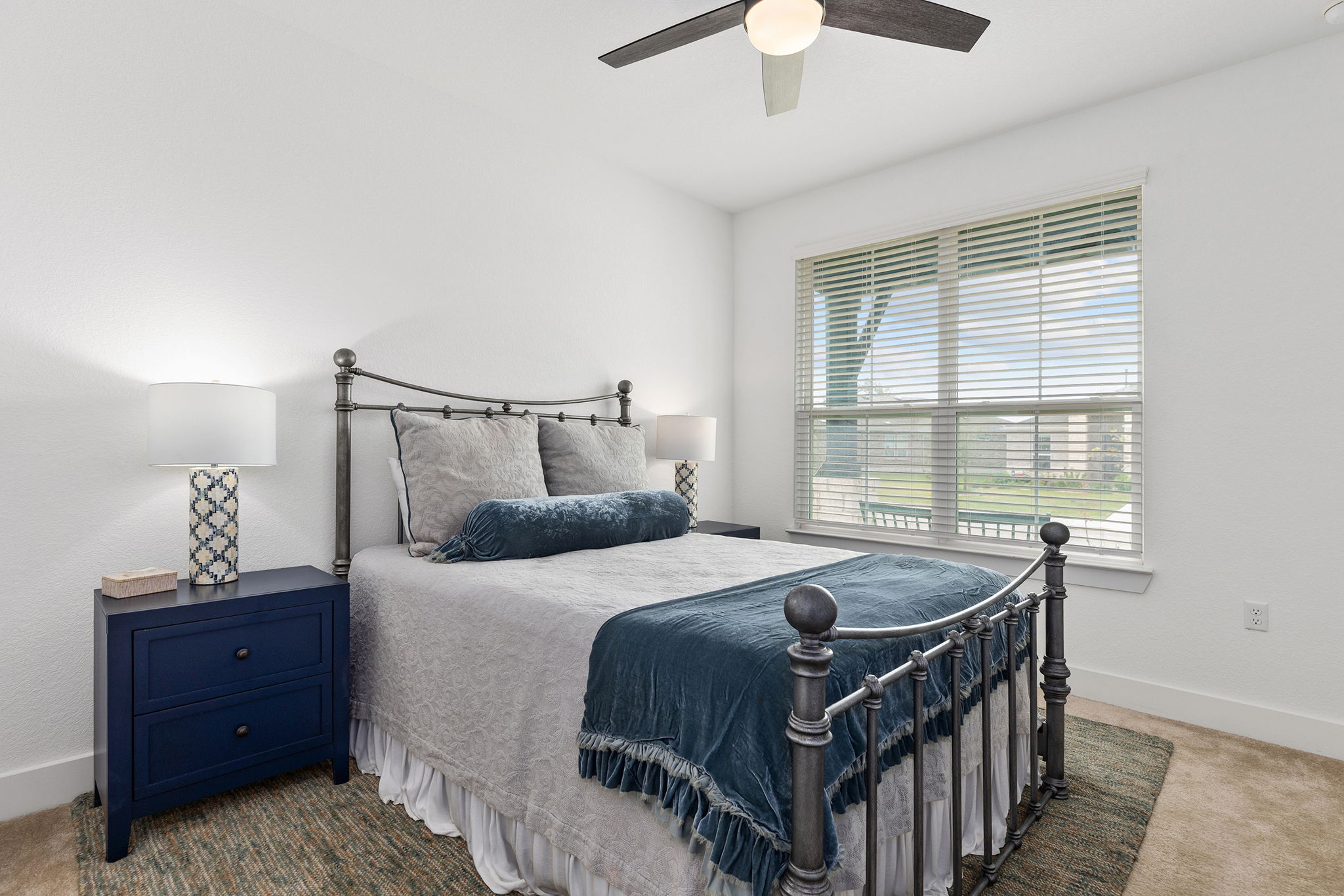 640 Martingale Street Georgetown, TX 78633 - Photo 9 of 39 Carpeted secondary bedroom featuring baseboards and ceiling fan