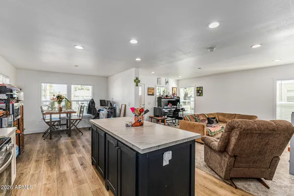 a view of a living room and dining room