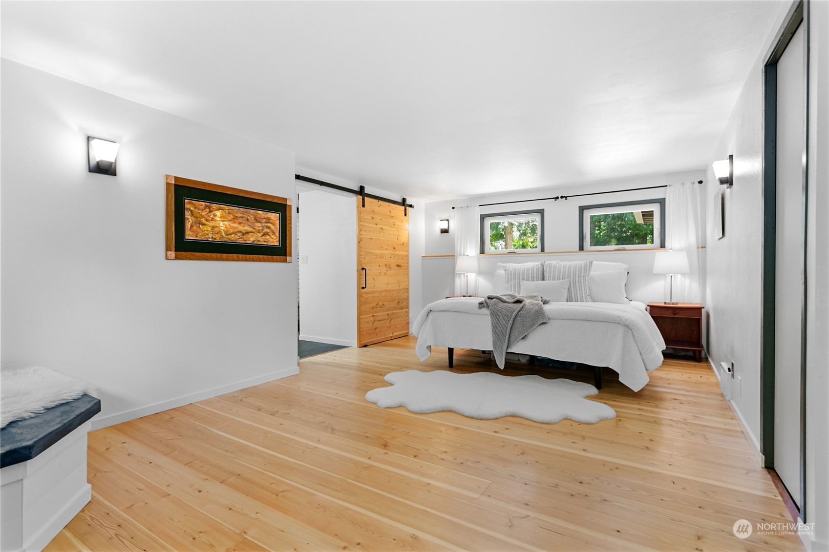 3734 Britton Road Bellingham, WA 98226 - Photo 12 of 40 a bedroom with a bed and wooden floor