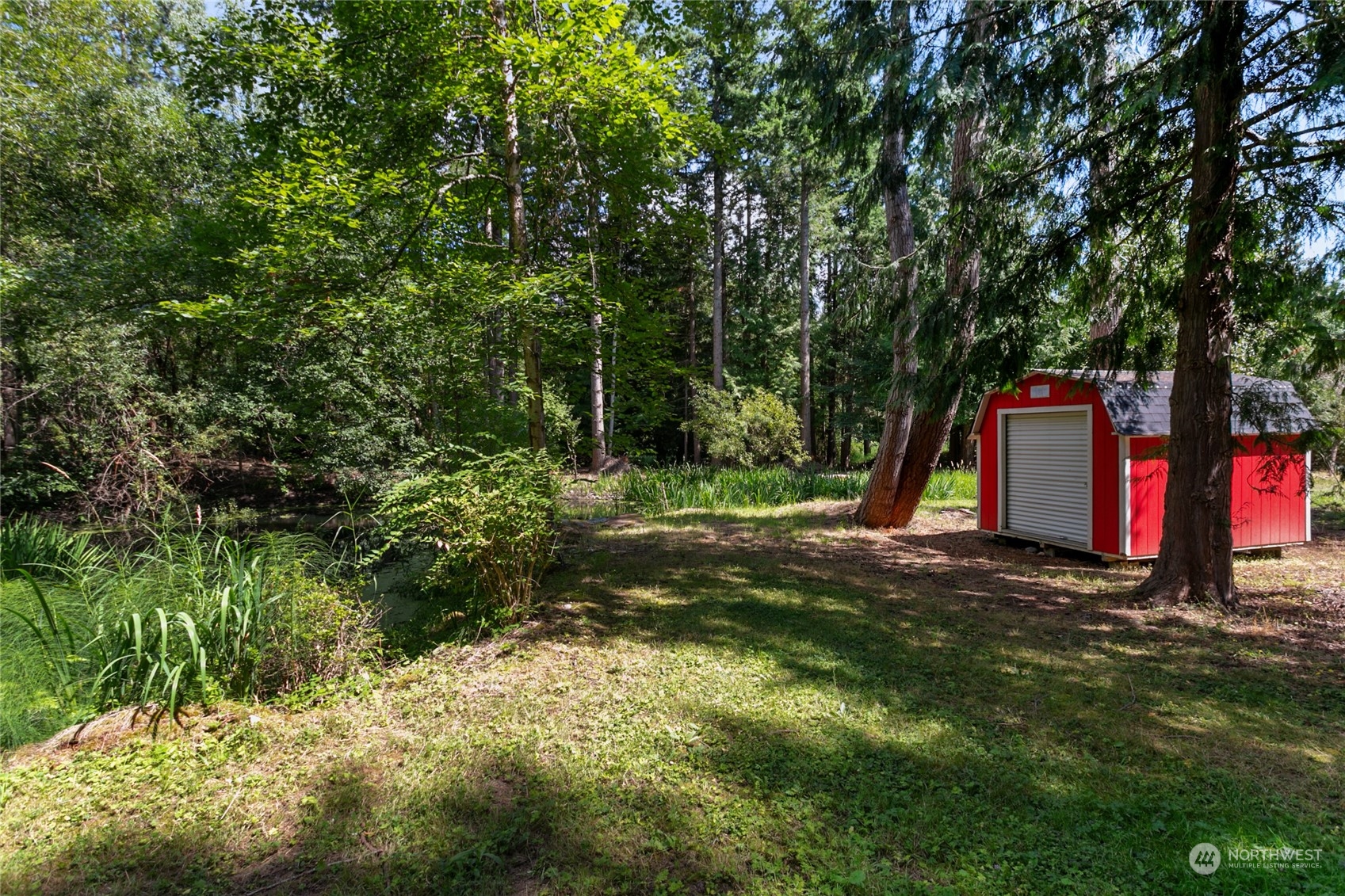 3734 Britton Road Bellingham, WA 98226 - Photo 33 of 40 a view of outdoor space with deck and trees