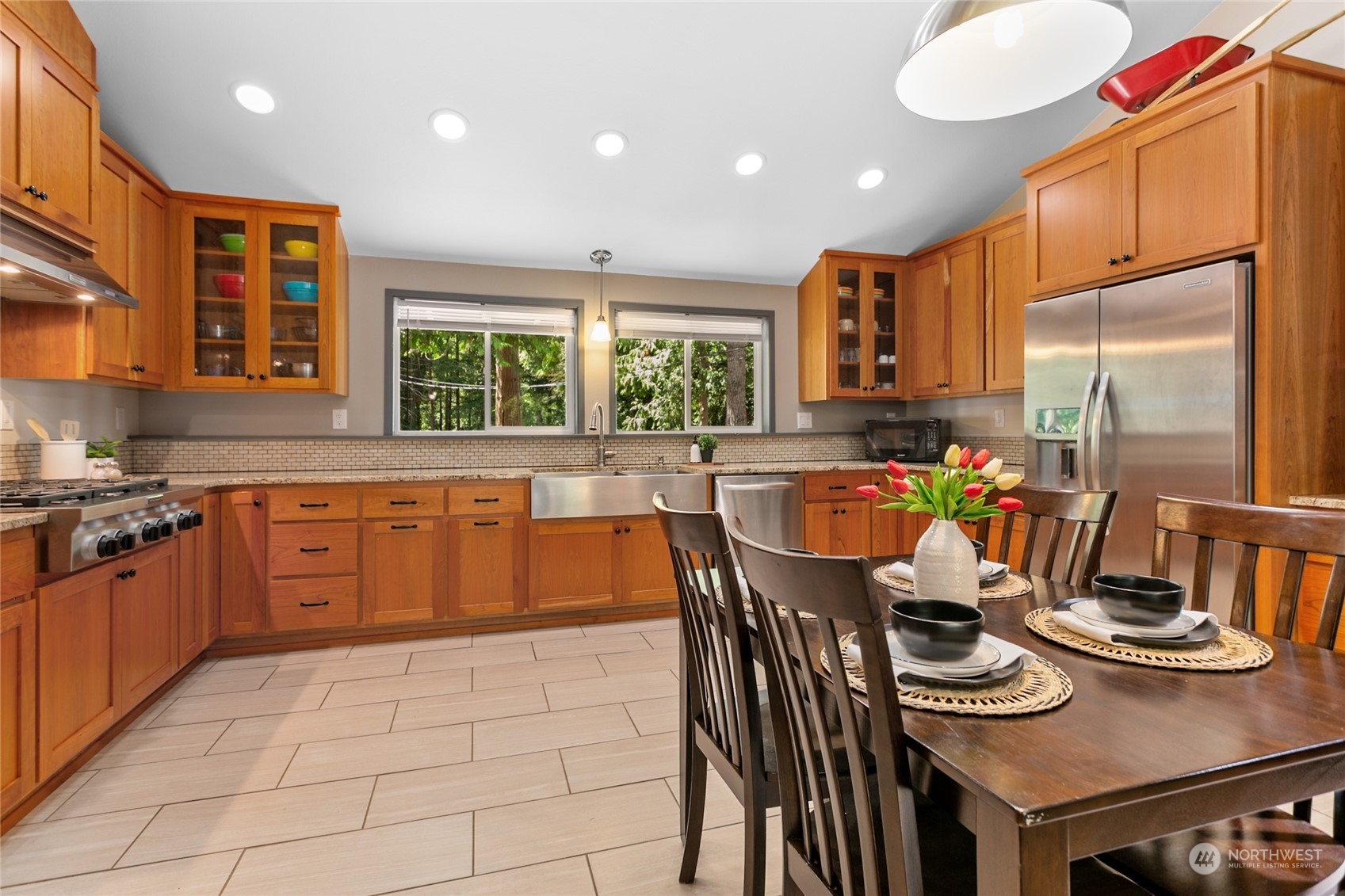 3734 Britton Road Bellingham, WA 98226 - Photo 8 of 40 a kitchen with stainless steel appliances granite countertop a stove a sink and a refrigerator