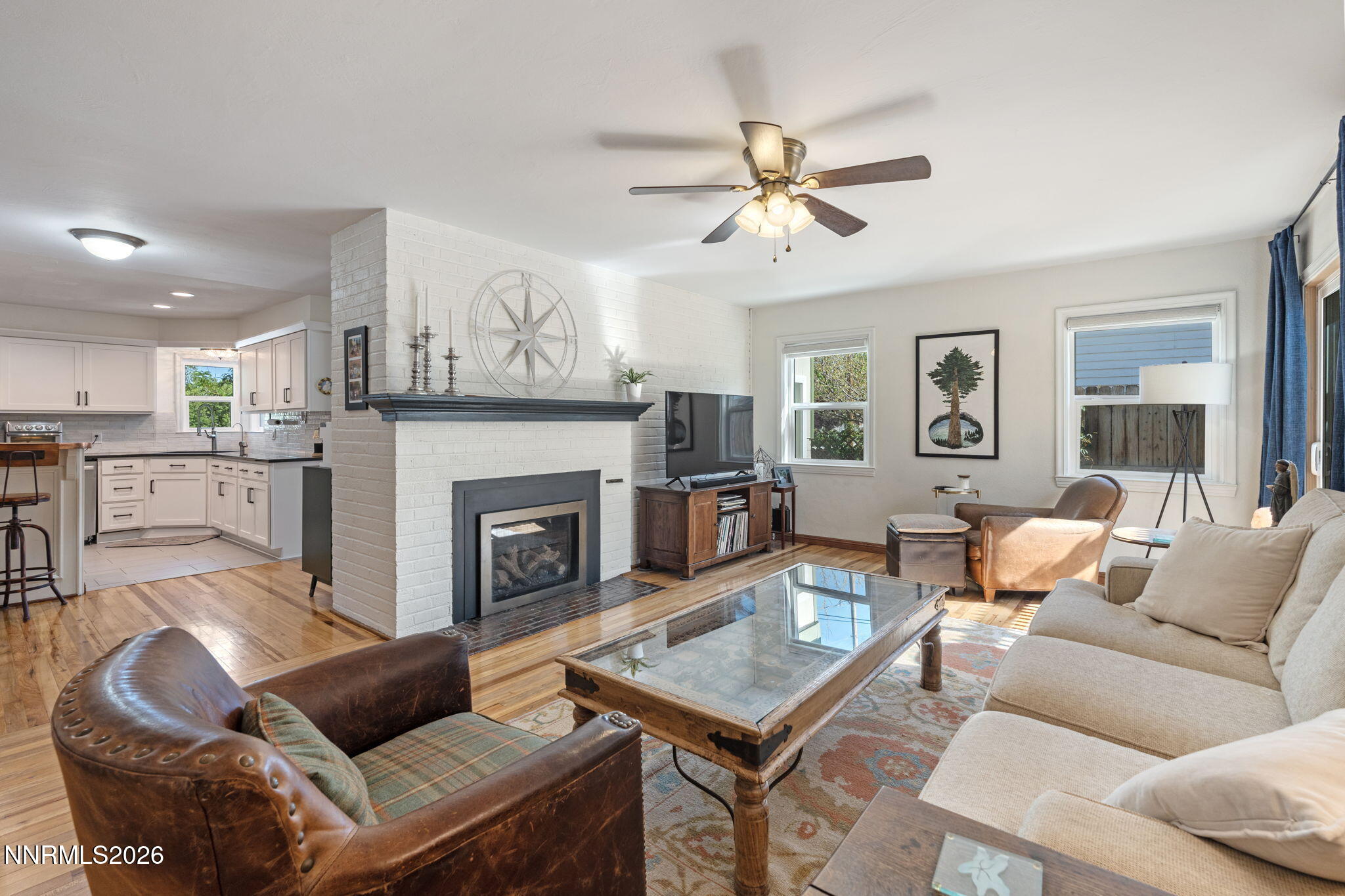 300 Country Club Drive Reno, NV 89509 - Photo 13 of 48 a living room with furniture and a fireplace