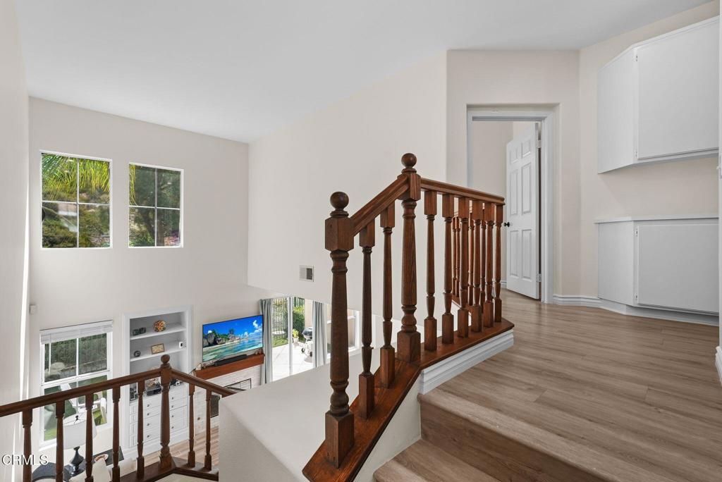 596 Fenwick Way, Unit C Simi Valley, CA 93065 - Photo 27 of 45 a view of entryway with stairs and wooden floor