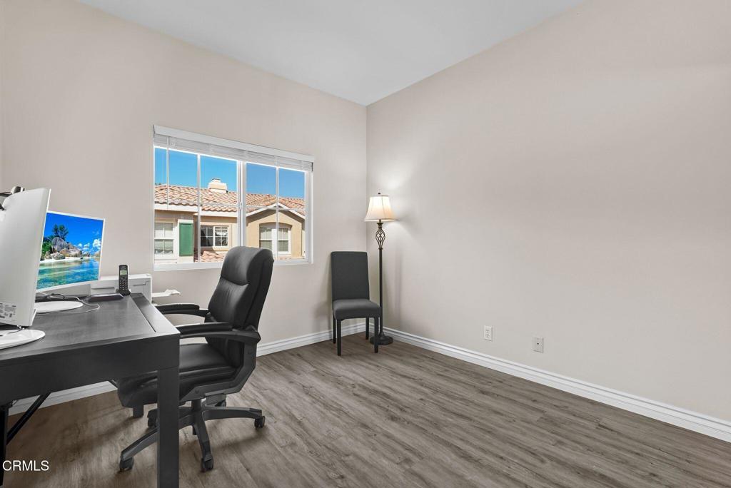 596 Fenwick Way, Unit C Simi Valley, CA 93065 - Photo 40 of 45 a view of a workspace with furniture and wooden floor