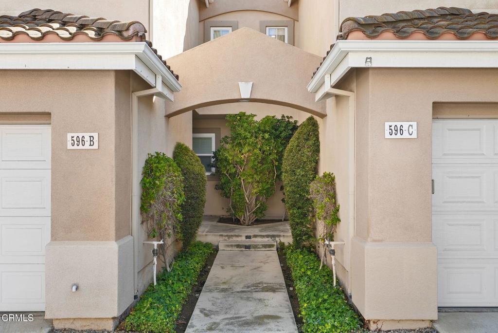 596 Fenwick Way, Unit C Simi Valley, CA 93065 - Photo 5 of 45 a front view of a house with garden
