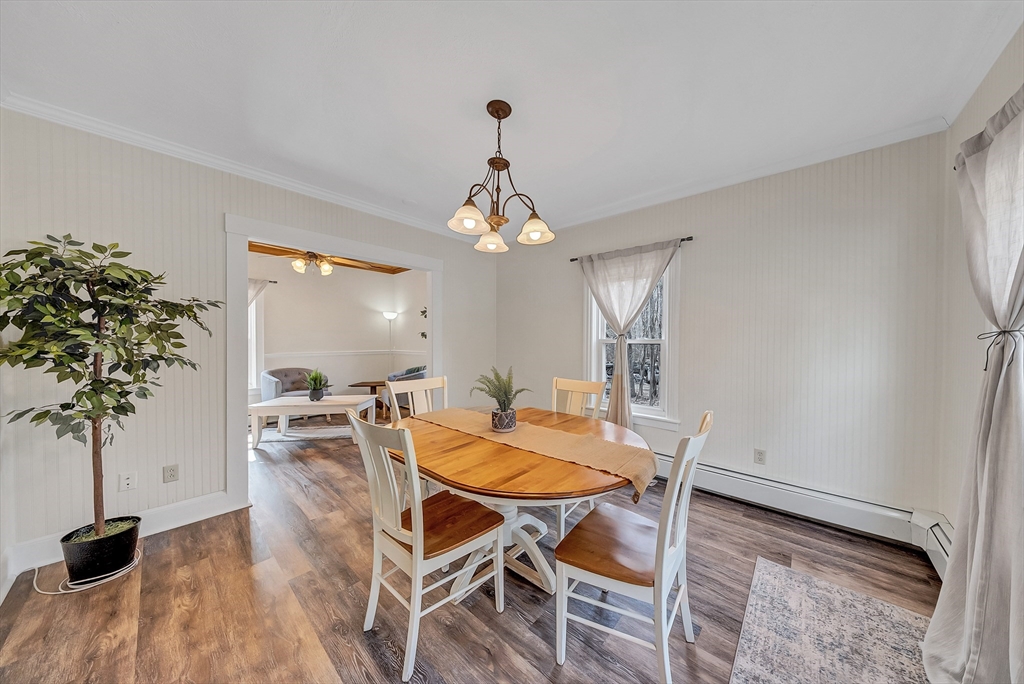 375 South Main Street Burrillville, RI 02859 - Photo 13 of 39 a view of a dining room with furniture and wooden floor
