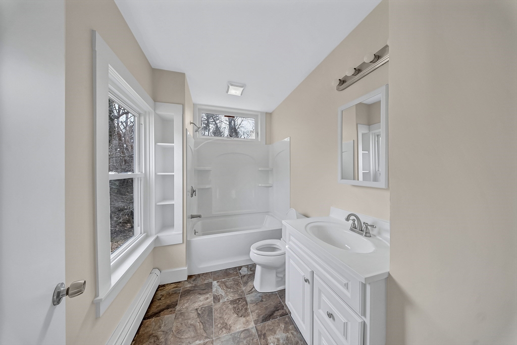 375 South Main Street Burrillville, RI 02859 - Photo 15 of 39 a spacious bathroom with a sink a toilet and shower