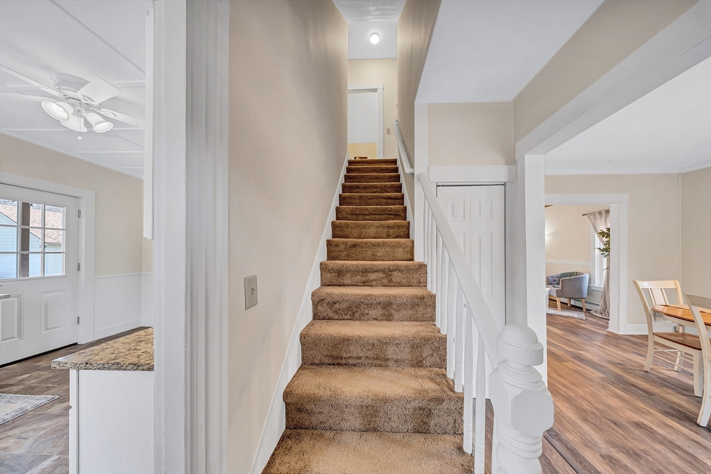 375 South Main Street Burrillville, RI 02859 - Photo 18 of 39 a view of an entryway with wooden floor and stairs