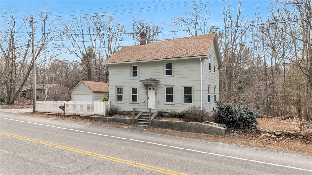375 South Main Street Burrillville, RI 02859 - Photo 2 of 39 a front view of a house with a yard and garage