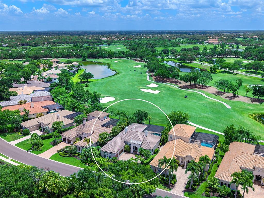 7431 Greystone Street Lakewood Ranch, FL 34202 - Photo 2 of 85 an aerial view of a house with a garden